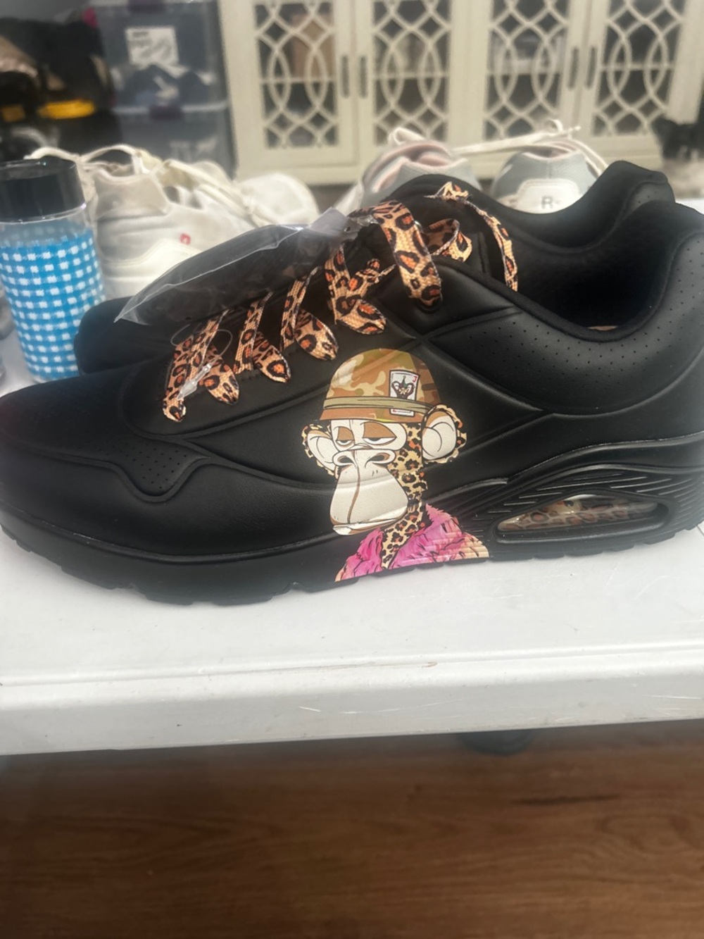 Skechers Black Athletic Sneakers with Leopard-Print Laces and Snoop Dogg colab